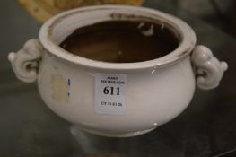 A Chinese blanc de chine twin handled censer.