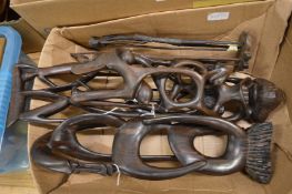 Stylised carved African wood figures.