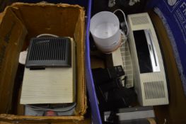 A Bose CD player and other items.