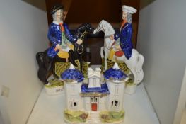 Two Staffordshire flatback figures, Tom King and Dick Turpin together with a Staffordshire cottage.