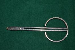 A pair of Christofle scissors.