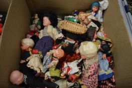 A collection of dolls of the world.