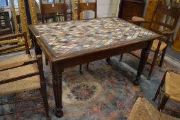 A 19th century mahogany and specimen marble inlaid rectangular library table.