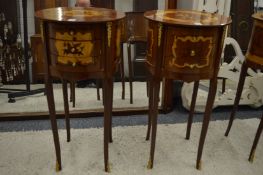 A pair of French style marquetry inlaid three drawer bedside tables.