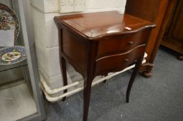 A mahogany two drawer bedside table.