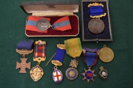A collection of various medals, badges etc.