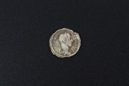 A silver Roman style coin.