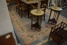 A Chinese pale blue ground carpet with floral decoration, 364cm x 268cm.