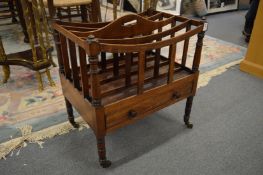 A good early 19th century rosewood four division Canterbury with a single drawer on turned legs with