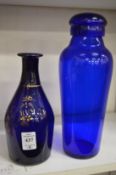 A small Bristol blue rum decanter and another item.