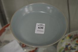 A Chinese small circular shallow dish.