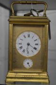 A good ormolu carriage clock with alarm and repeat movement.