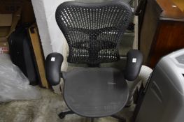An office swivel armchair.