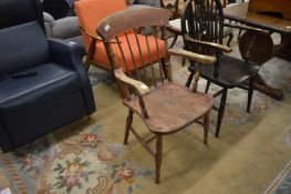 A beech and elm stick back armchair.