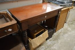 A mahogany side table.