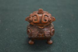 A small bronze vase and cover.