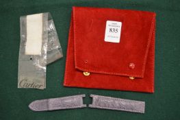 A Cartier watch strap in velvet case.