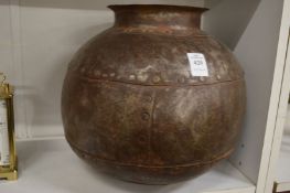 An Indian riveted steel globular shaped vessel.