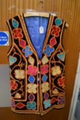 An Eastern embroidered waistcoat.