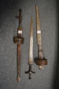 Two North African Tubang Takouba swords with scabbards.