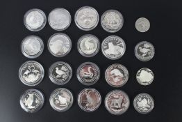 A collection of Commemorative silver coins.
