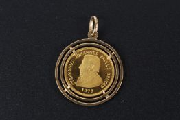 A 9ct gold Commemorative coin.
