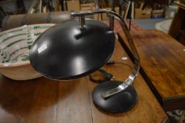 A Fase model 520 black and chrome desk lamp.