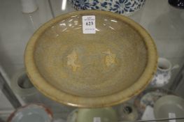 A Chinese crackle glazed dish moulded with two fish.