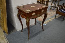 A good 19th century French kingwood work or dressing table with ormolu mounts, inlaid with porcelain