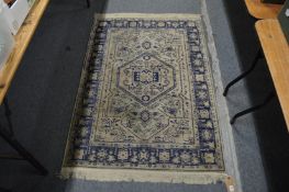 A Persian style rug, 145cm x 100cm.