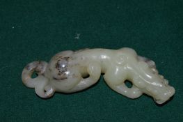A carved jadeite model of a beast.