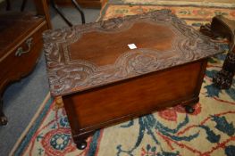 A small mahogany box with Eastern carved hardwood lid.