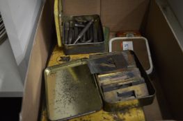 Brass letter stencils and other items.