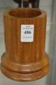 Linley, a turned and fluted wooden column style pen pot.
