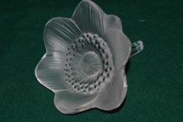 A Lalique frosted glass model of a flower.