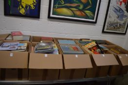 Ten boxes of assorted books.