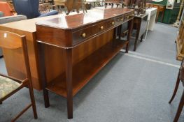 A good modern mahogany three drawer side table with undertier.