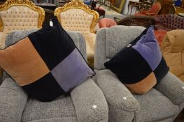 A large pair of Liberty cushions.