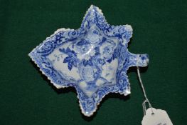 A blue and white porcelain leaf shaped pickle dish.
