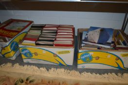 Six boxes of assorted books.