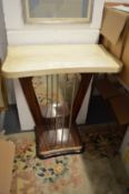 An Art Deco style laminated and mirror backed console table.