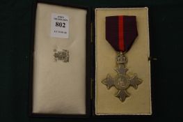 A military MBE, boxed.