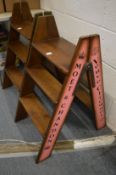 A pair of novelty folding steps.