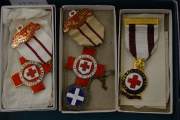 A group of Red Cross medals.