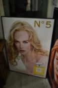 Two Chanel No.5 advertising posters and other similar items.