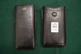 A Dunhill leather cigar case.