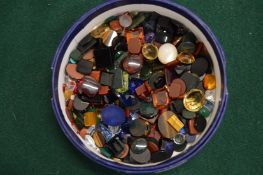 A box of colourful stones.