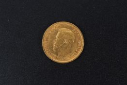 A gold ten ruble coin, 1899.