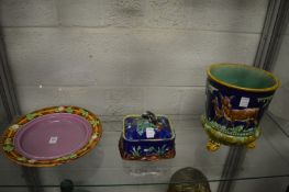 Three pieces of Majolica to include a circular dish, sardine box and cover and a jardiniere