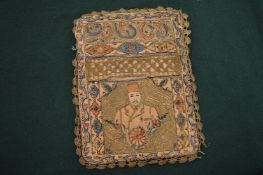 An Islamic embroidered bag.
